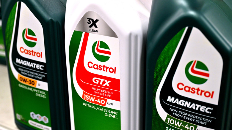 Bottles of motor oil lined up.