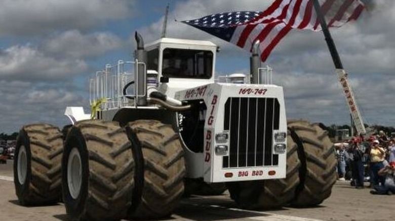 Big Bud with American flag waving