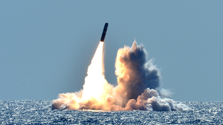 An UGM-133 Trident II launches from below the surface of the water from the USS Nebraska