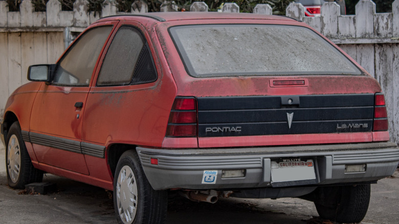 Red 1988 Pontiac LeMans