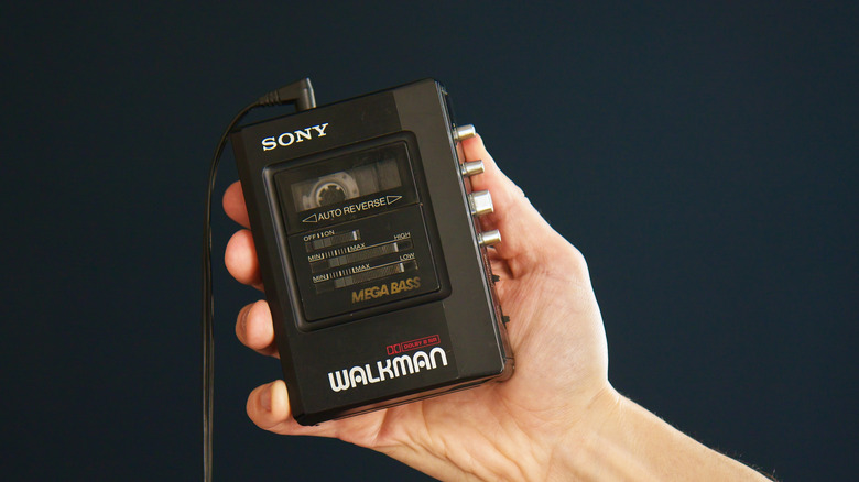 Person holding a Walkman.
