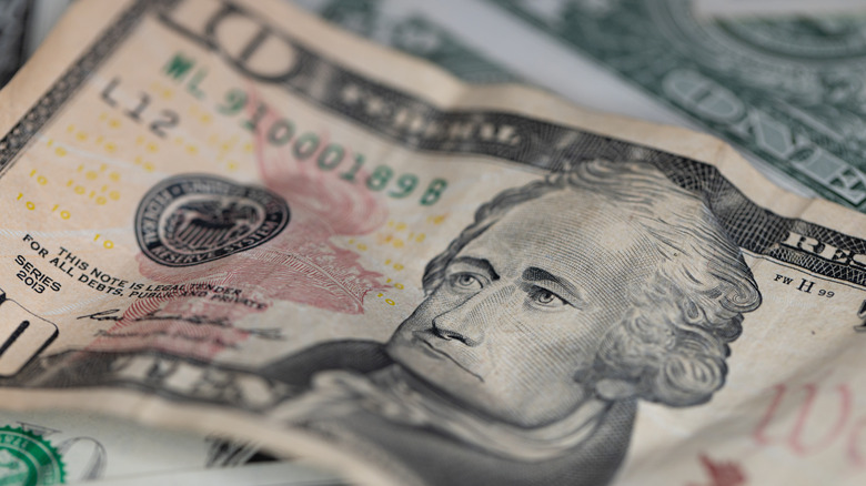 a crumpled $10 bill