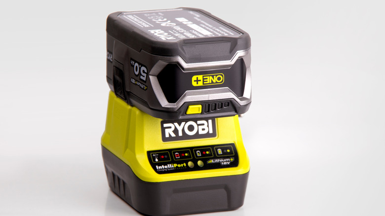 Battery for RYOBI spanner on gray background