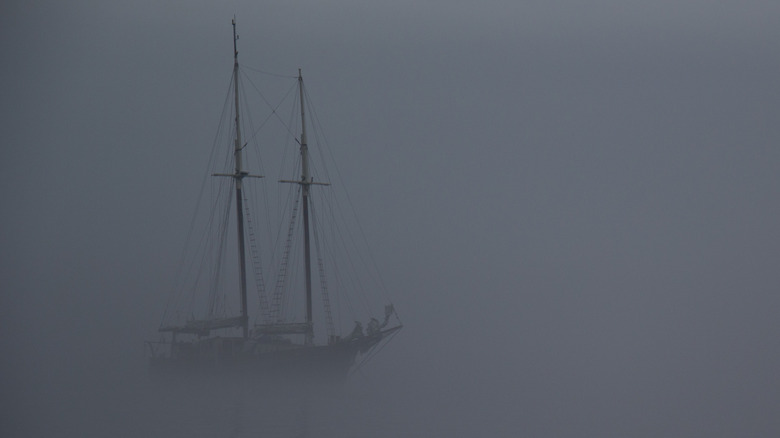 Ghost ship in the distance in fog