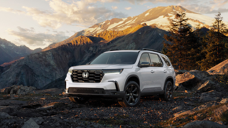 A white 2025 Honda Pilot parked