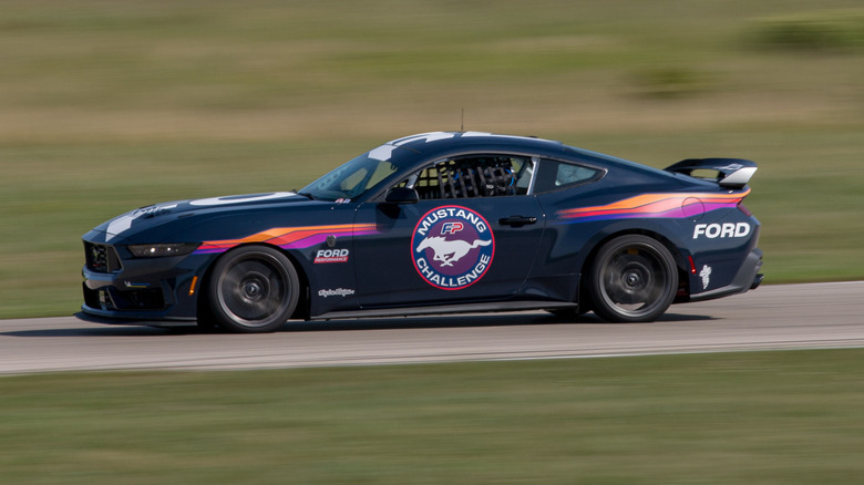 Ford Mustang Dark Horse R driving on track