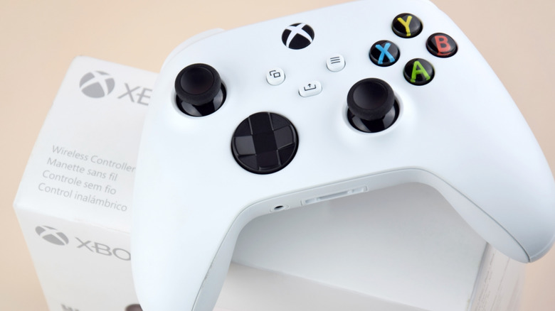 White Xbox controller on Xbox controller packaging