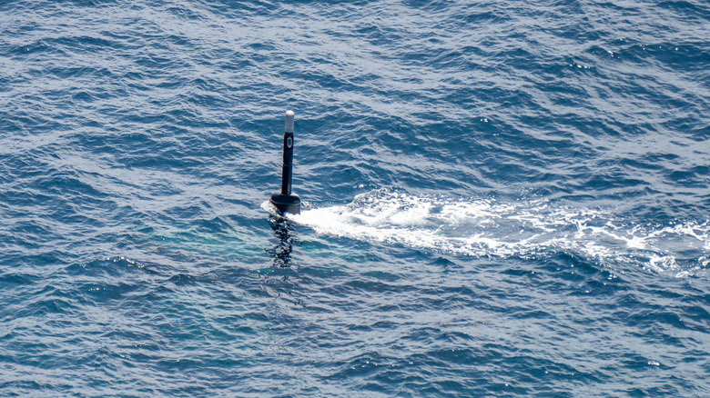 Submarine periscope sticking out of water