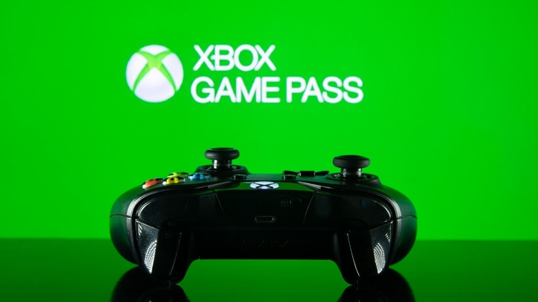 Xbox controller in front of Game Pass logo