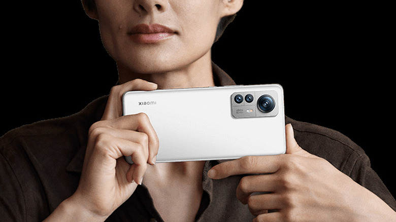Woman holding Xiaomi 12S Pro