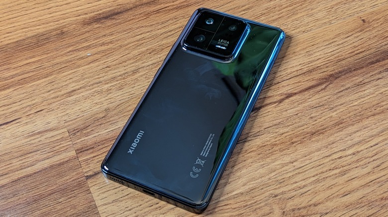 Xiaomi 13 Pro Back against wood floor