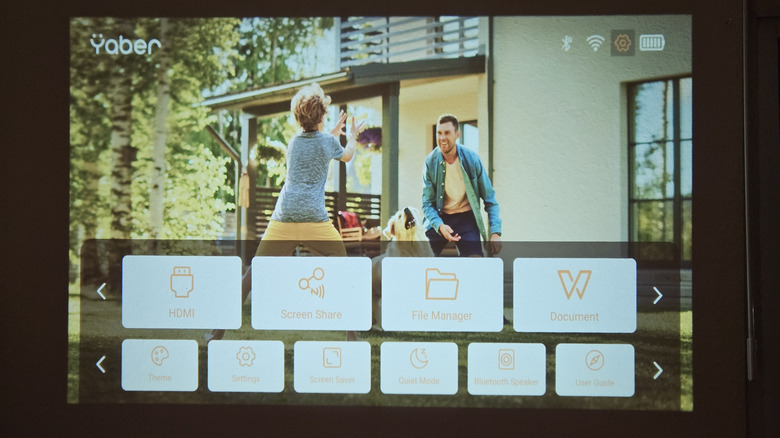 The home screen for Yaber OS with options for HDMI, Screen Share, and Settings.