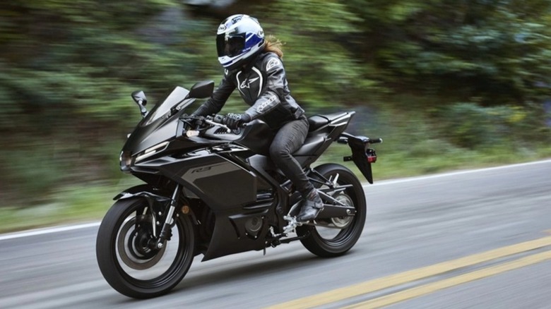 A rider on the Yamaha R3 sportbike.
