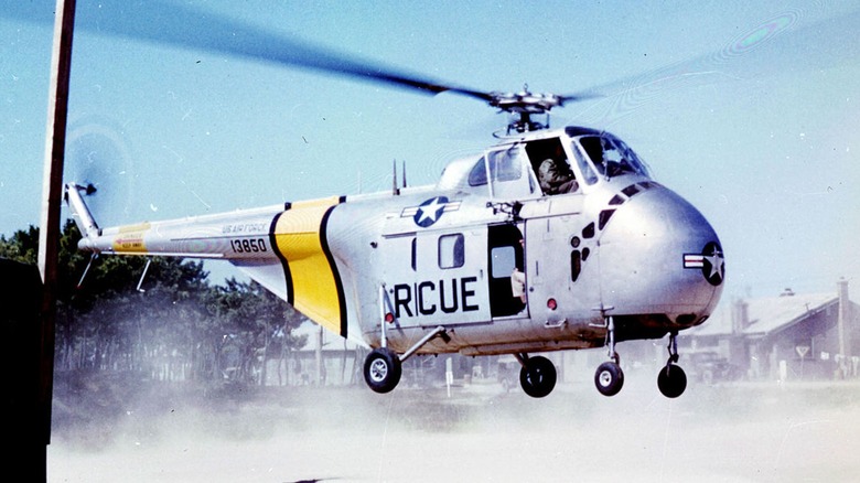 An Air Force SH-19A helicopter preparing for takeoff.