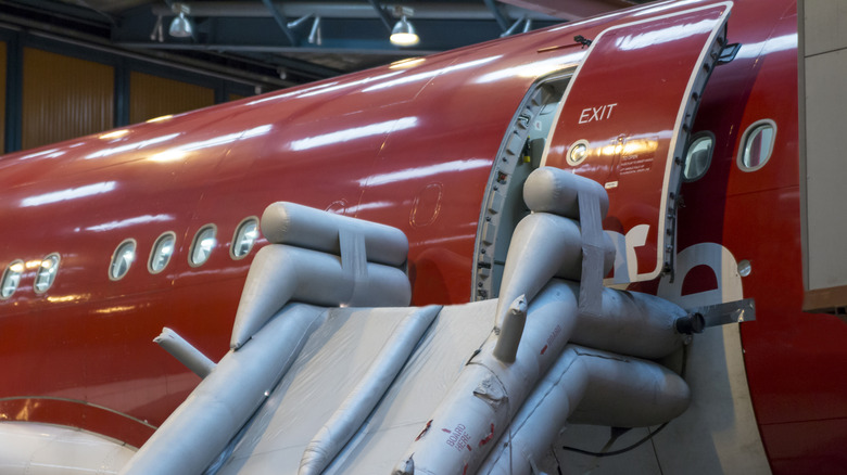 emergency exit slide deployed on an airplane