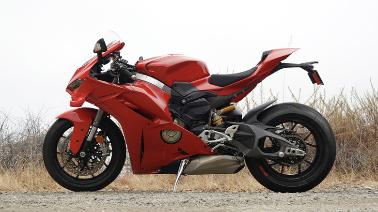2025 Ducati Panigale V4 side profile on a dirt turnout