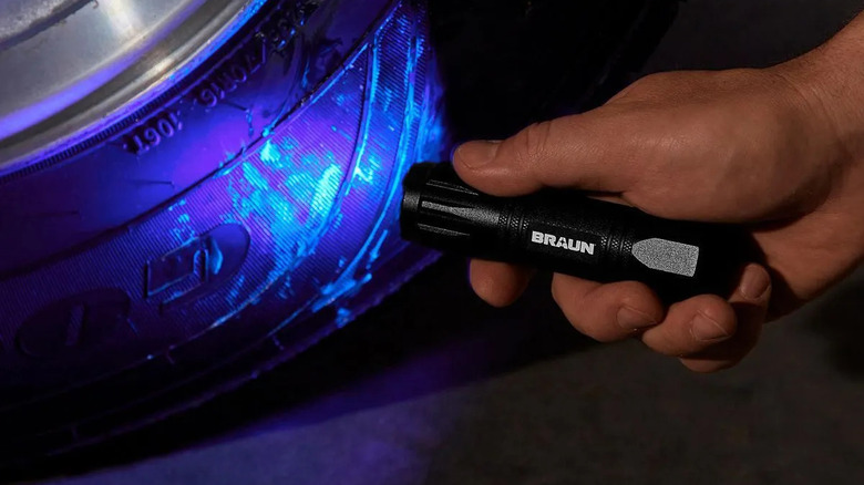 A person using UV light