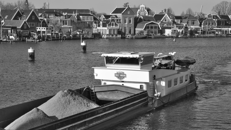 Black and white photo of a Harley-Davidson Barge on the Zaan River