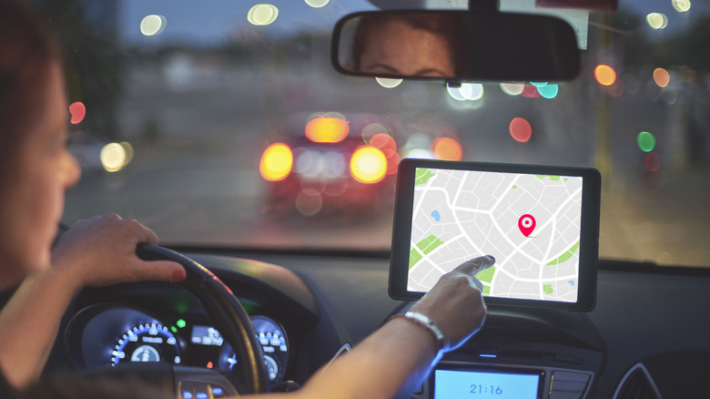 woman using gps while driving