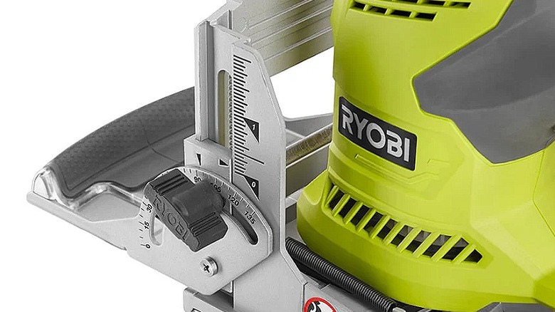 Close up of Ryobi Biscuit Joiner on white background