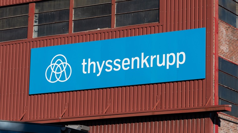 The Thyssenkrupp logo on a building