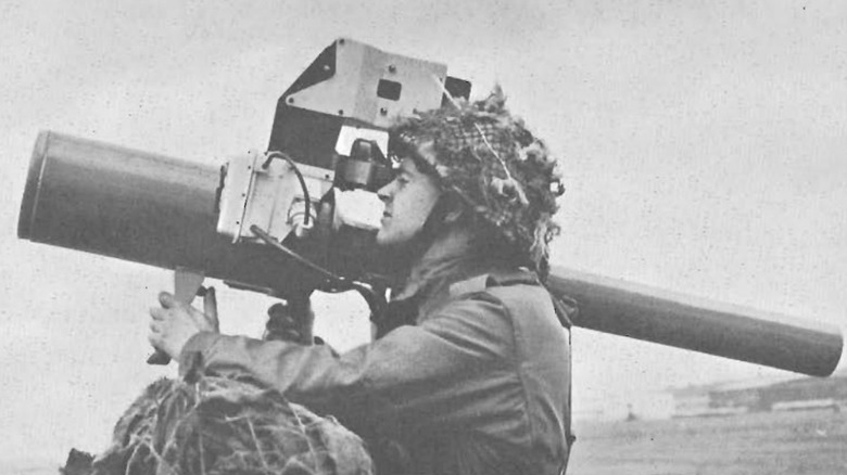 A black-and-white photo of a blowpipe missile being fired.