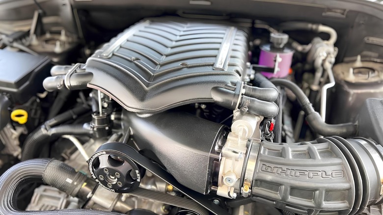 Whipple supercharger bolted on top of a 5.7 liter HEMI in Dodge Durango