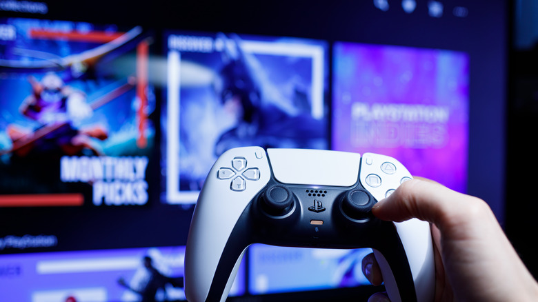 PS5 controller in front of a screen