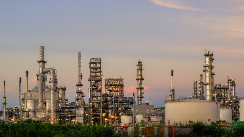 An oil refinery from afar during dusk