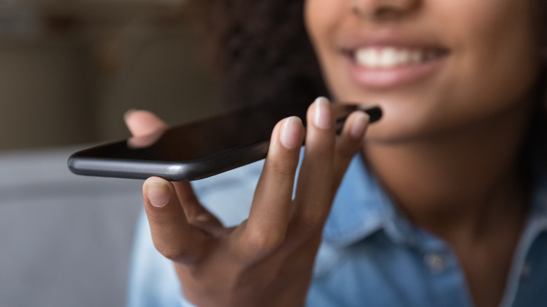 woman speaking into iphone