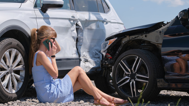 Woman on phone after accident