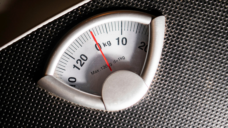 Close-up view of a spring-type bathroom scale