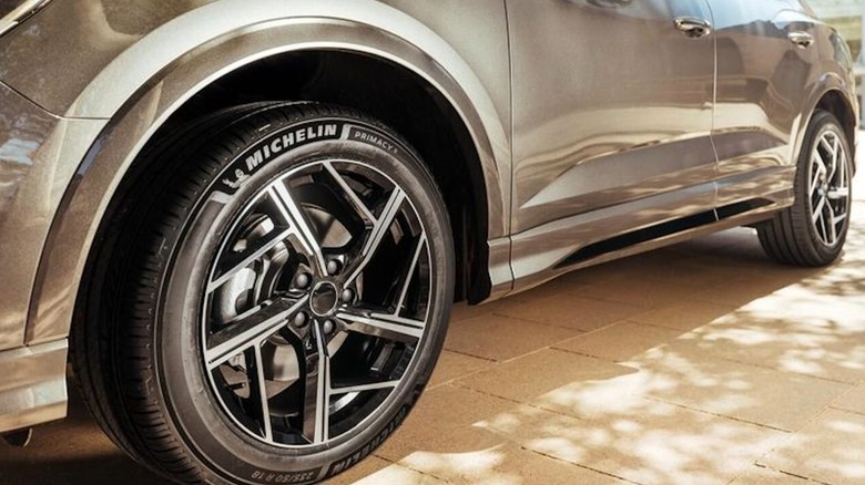 Close-up of Michelin Primacy5 tire on a parked car