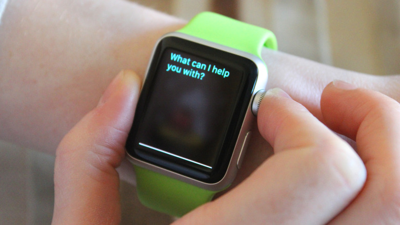 Person using Siri on an Apple Watch.