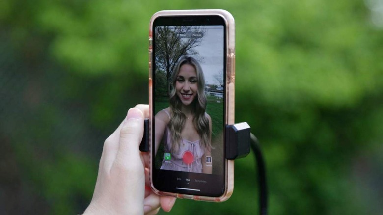 Popular TikTok creator Katie Feeny recording a video 