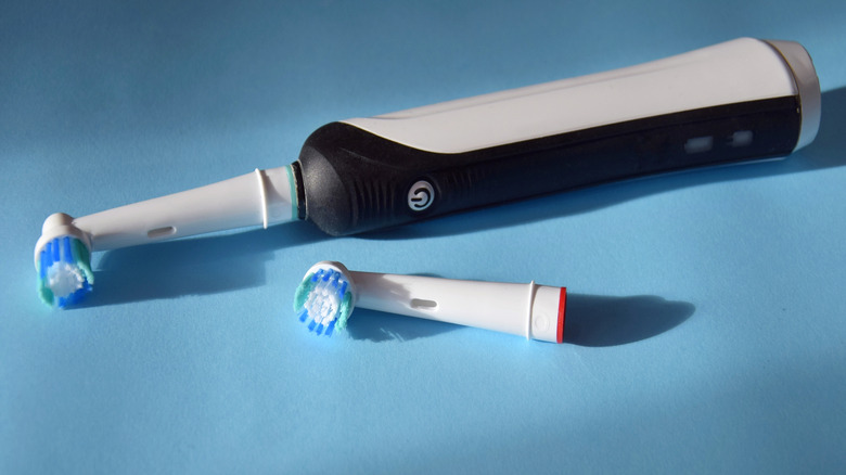 Electric toothbrush with spare head