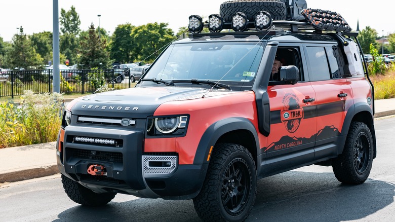 2022 Land Rover Defender vehicle, side view.