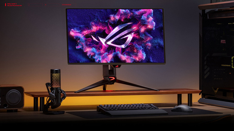 Asus ROG Swift OLED monitor on a monitor riser