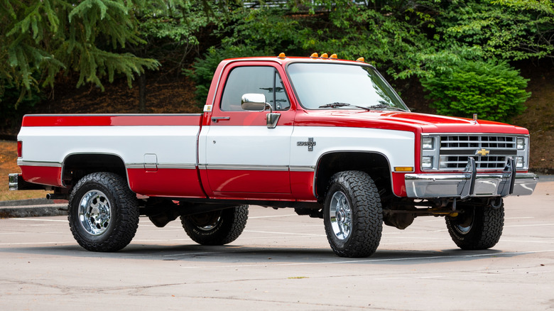 Red-White Old Chevrolet C-K 30 classic pickup truck