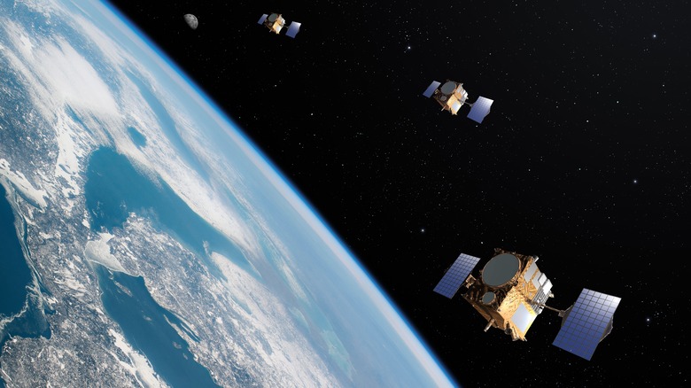 satellites orbiting earth in space