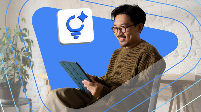 A man reading on a tablet, a blue lightbulb drawn next to him.