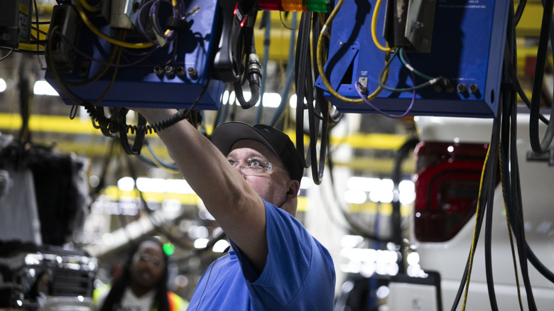 Ford manufacturing plant employee at work