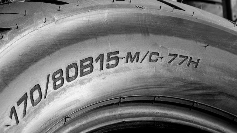 Road motorcycle rear tire size inscription on the sidewall of the tire