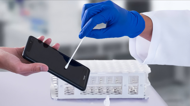 Depiction of a phone swab test.
