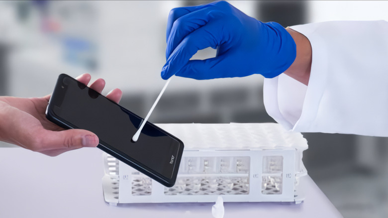 Depiction of a phone swab test. 