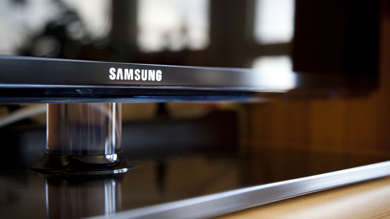 Close-up of Samsung Smart TV bezel with the brand logo in the center