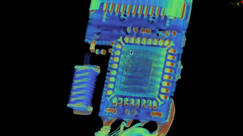 Microcontroller and 2.4GHz radio visible in CT scan of O.MG cable