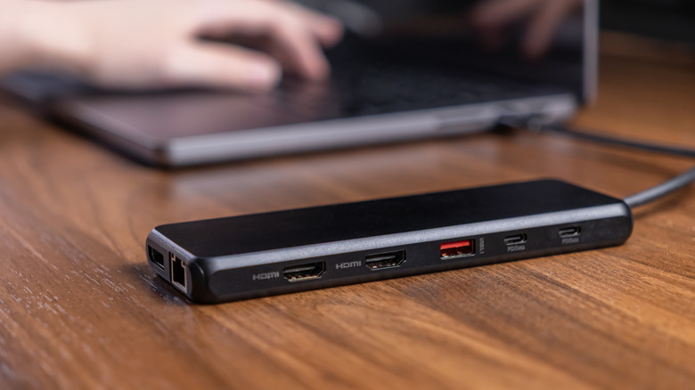 A USB to HDMI dongle connected to a laptop