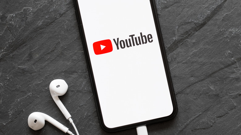 YouTube app smartphone earbuds