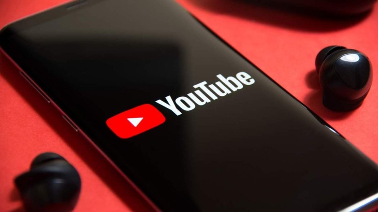 YouTube logo on smartphone